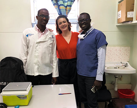 CHOMP Community Oral Health Officers Farhan Haret and Vincent Owiti with the DeRouen Center Program Manager at the Comprehensive Care Clinic in Nairobi, Kenya.