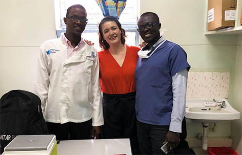 CHOMP Community Oral Health Officers Farhan Haret and Vincent Owiti with the DeRouen Center Program Manager at the Comprehensive Care Clinic in Nairobi, Kenya