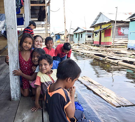 Children on dock in Asia