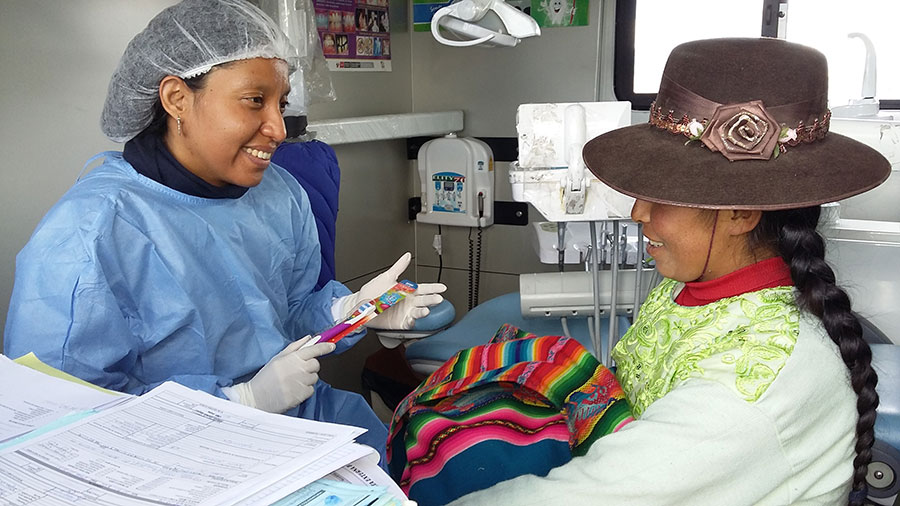 Dr. Cabrera-Matta with a dental patient