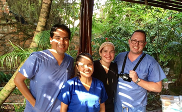 Dr. Marco Alarcon (far left) and Dr. Ana Lucia Seminario (2nd from right) with dental students in Iquitos, Peru.