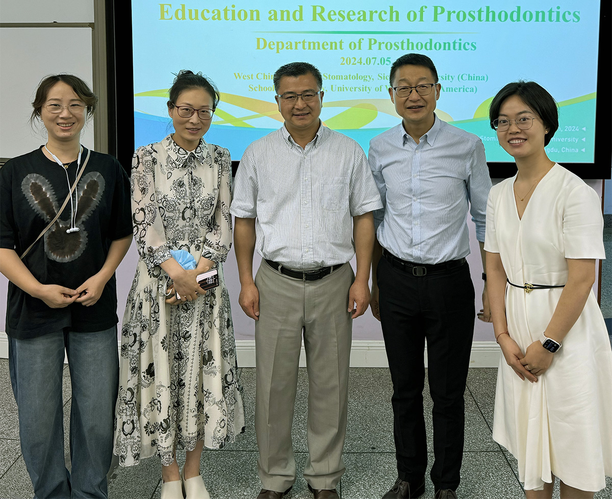 Dr. Zhang (center) with colleagues at UIP conference in Chengdu, China