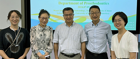 Dr. Zhang (center) with colleagues at UIP conference in Chengdu, China