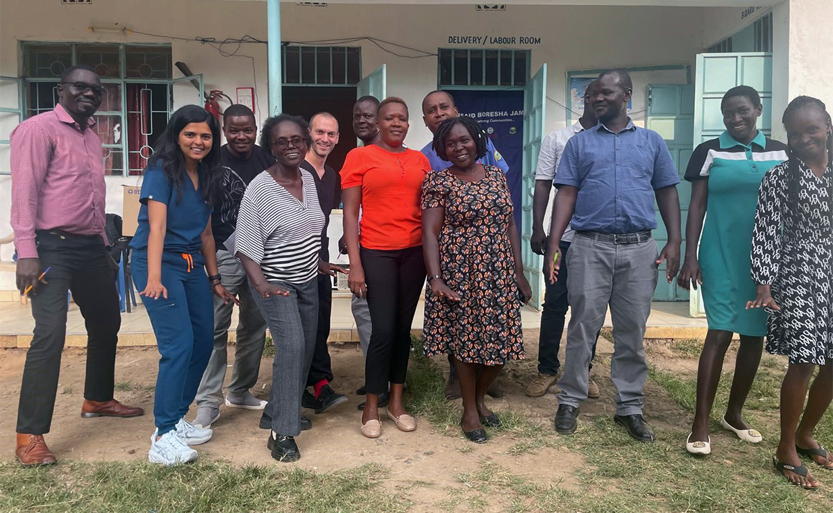 Priyanka Prajapati (2nd from left), Dr. Immaculate Opondo (4th from left), and Delbert Oxborrow (5th from left) at a clinic in Kenya